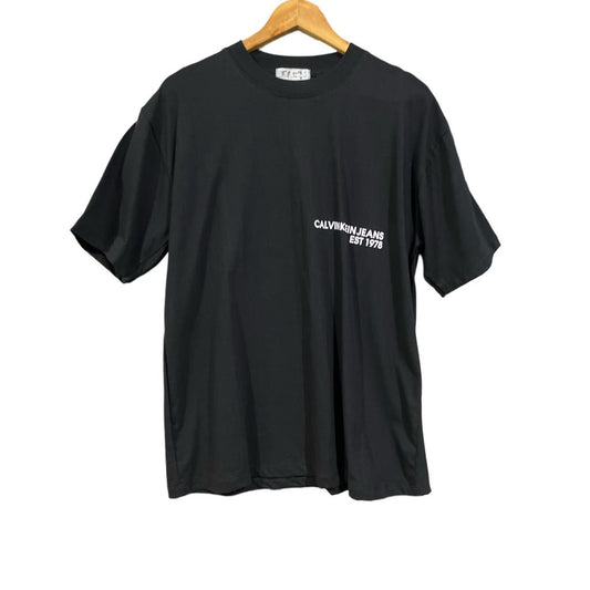C. Kle!n Oversized Tee